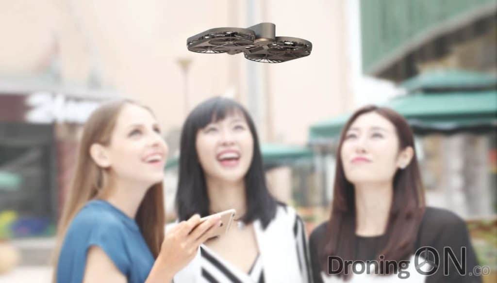 The new SimToo Moment Drone capturing a selfie whilst hovering in the air outdoors.