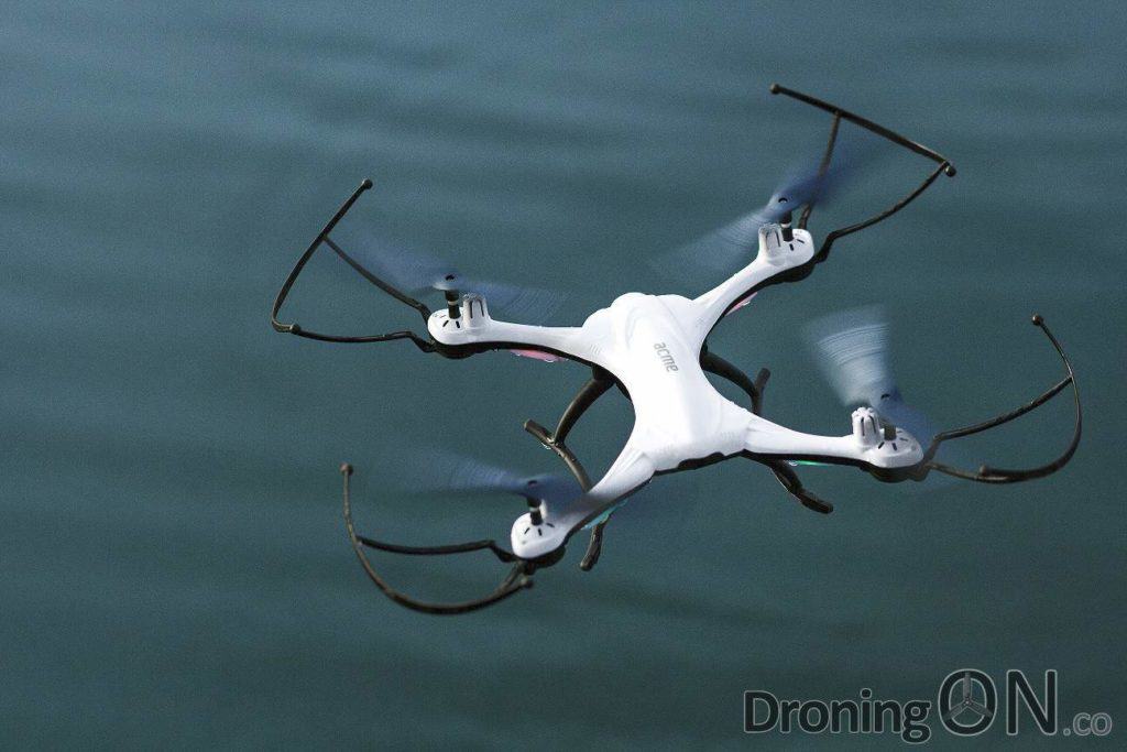 The Acme X8300, also known as the JJRC H31, stated as a waterproof drone and shown hovering above water in marketing shots.